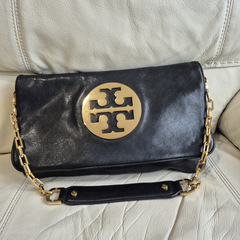 Tory Burch Elegant Black Clutch with Gold Details